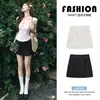 Falda corta de lunares blancos para mujer, nuevo estilo verano 2026, falda de línea A adelgazante de cintura alta, falda lápiz de traje petite