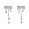 Novos brincos de strass de luxo europeus e americanos de alta qualidade, brincos longos com franjas para mulheres, brincos de diamante com laço da moda
