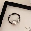 Nueva Cuerda de Pelo con Perla Sonriente Simple Banda Negra para el Cabello Alta Elástica Duradera Anillo para Cola de Caballo Cuerda para el Pelo con Bola