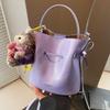 Bolso de Cubo con Cordón de Diseño de Nicho para Mujer 2026 Nuevo Modelo Bolso de Mano Bolso de Mariposa Bolso de Hombro Cruzado de Cuero Suave de Moda