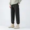 Calças casuais masculinas grossas com forro de fleece, estilo montanha para outono e inverno, calças de moletom cargo impermeáveis e corta-vento para atividades ao ar livre, calças compridas masculinas largas