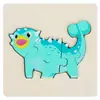 Juguete de rompecabezas de dinosaurio tridimensional con hebilla de madera para niños, rompecabezas creativo de dibujos animados para la educación temprana del bebé