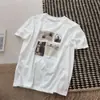 2026 Nueva Moda Estilo Coreano Camiseta de Cuello Redondo Manga Corta para Mujer, Top Versátil Holgado Adelgazante, Top Blanco de Manga Corta Estampado para Mujer