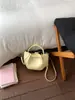 Bolso de Mujer de Gama Alta 2026 Nuevo de Moda Primavera Super Popular Pequeño Bolso Tote para el Trabajo Bolso Cruzado de Hombro Único Bolso Cubo