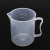 Copo medidor de plástico ecológico de 500ml disponível em estoque. Ideal para confeitaria, chá com leite, vinho e outros utensílios.