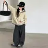 Conjunto de primavera y otoño para niñas 2026 nuevo conjunto de dos piezas de cárdigan de punto de moda estilo coreano y pantalones de pierna ancha para niños mayores