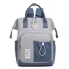 Nova bolsa de maternidade transfronteiriça, bolsa de armazenamento simples multifuncional, grande capacidade, pode ser carregada como bolsa de ombro ou bolsa de mão, mochila feminina moderna