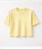 Camiseta de algodón 100% estilo retro americano lavado, top corto de moda urbana con abdomen al descubierto, de manga corta, top moderno para mujer en un estilo atrevido