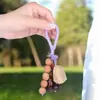 Colgante sonajero de cáscara de planta natural, Adorno de llavero de bolsa de paz Bodhi, Accesorio artístico hecho a mano