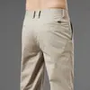 Pantalones casuales para hombre 2026 nuevo otoño rectos holgados de alta gama pantalones de vestir largos marca juvenil moderna