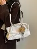 Bolsa de mão estilo despojado, bolsa grande capacidade para o dia a dia casual, nova bolsa de ombro/axila 2026, moderna e única
