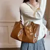 Bolsa tote retrô de cor sólida estilo faculdade coreana, nova moda outono 2026, grande capacidade, simples, versátil, bolsa de ombro