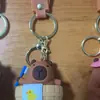 Figuritas de llavero de goma blanda de anime de dibujos animados, colgantes para mochila, accesorios para bolsos, pequeños adornos, al por mayor en stock para tiendas