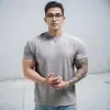 Camiseta Deportiva Nueva de Verano Textura Pesada Almohadilla Hombro Puño Manga Larga Anti-Arrugas Secado Rápido Fitness Running Hombre Descanso
