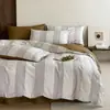 2026 Novo Estilo Ins Fresco e Simples Jacquard Waffle Lavado em Alta Temperatura Algodão 100% Algodão Lavado Conjunto de Quatro Peças - Série de Tecidos