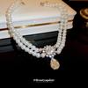 Collar de perlas en forma de gota de doble capa con incrustaciones de diamantes estilo Chanel estilo francés elegante cadena para la clavícula moda de alta gama collar elegante