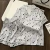 Pijama Xadrez Jacquard de Seda Imitação Estilo Celebridade da Internet para Mulheres Conjunto de Duas Peças de Seda Gelada com Mangas Longas para Casa Primavera e Verão 2026 para Mulheres