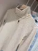 Camiseta básica de terciopelo grueso con cuello alto para mujer para otoño e invierno, camiseta de manga larga de cuello medio alto, top a rayas elegante adelgazante