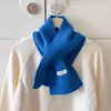 Bufanda de punto cruz 100% lana pura súper versátil, una bufanda pequeña para otoño e invierno, que proporciona calor y protección para el cuello, perfecta para días de descanso. Fabricante