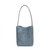 Bolsa de Mano de Moda Calada Estilo Verano 2026 con un Toque de Lujo, Elegante Bolso Cubo de Hombro Simple de Gran Capacidad