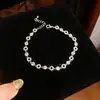 Pulsera de flor redonda con cierre de circonita, lujo ligero, alta gama, pulsera exquisita con un diseño elegante, versátil y a la moda, venta al por mayor