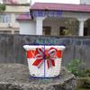Cesta de flores pequeña mini cesta tejida de ratán lazo tejido juguetes decorativos adornos para cesta de flores de coche al por mayor en stock fabricantes