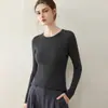 Suéter de punto fino de lana de alta gama sin costuras con cuello en U y corte ajustado para mujer, de manga larga, adecuado para usar en capas en otoño e invierno, top de punto fino