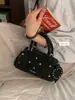 Bolsa de Mão Feminina Texturizada Vintage 2026 Novo Estilo Bolsa Almofada Simples Versátil Bolsa de Ombro Transversal Atacado