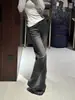 Chao Li tiene en stock jeans de tiro bajo microcampana en negro y gris para mujer, nuevo estilo Otoño 2026, pantalones campana versátiles para estilizar a la chica popular