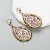 Estación independiente aretes más vendidos aretes femeninos europeos y americanos creativos de aleación Diamante lentejuela aretes exagerados hechos a mano con cuentas aretes personalizados