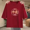 Liquidación de camisetas de diseñador para mujer de comercio exterior, manga tres cuartos, corte holgado, tops adelgazantes para usar en capas