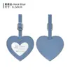 Etiqueta de equipaje con forma de corazón de cuero PU colorido en stock transfronterizo, etiqueta de equipaje simple anti-pérdida, etiqueta de facturación