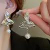 Nuevos Pendientes de Flor de Aguja China con Borla de Gota de Agua, Moda Retro Elegante, Pendientes Versátiles, Pendientes de Lujo Ligero y de Alta Gama
