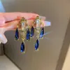 Brincos Longos com Franja de Cristal Borboleta Diamantada com Pino de Prata Brincos Elegantes Retrô Europeus e Americanos Brincos de Luxo Leve de Alta Qualidade para Mulheres