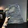 Xintang Denim Outono 2026 Calças Afuniladas Estampa Simples Azul Vintage Jeans Longo Stretch Novo Produto Masculino