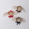 Sombreros Coreanos para Bebés Qiunan Primavera y Otoño Nuevos Lindos Sombreros con Protección para las Orejas para Niños y Niñas, Sombreros con Lazo, Sombreros para Bebés