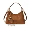 Bolsa feminina casual estilo coreano, novo modelo outono e inverno 2026, bolsa de ombro versátil e elegante, bolsa transversal tipo bolinho de grande capacidade para o dia a dia
