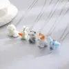 Colares Série de Animais Fofos Flocados Transfronteiriços Corgi Bichon Elefante Azul Coelho Panda Pingente Colares Outono e Inverno
