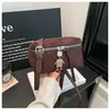 Bolso de Mujer Nuevo de Gran Venta Transfronterizo con Diseño de Nicho, Textura Mate, Bolso Cuadrado Pequeño, Bolso de Hombro Simple y de Moda Tendencia