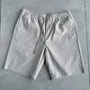 Shorts casuais de verão para homens com cordão na cintura elástica, shorts casuais soltos populares da moda de comprimento médio, shorts simples versáteis para homens