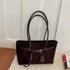 Moda Otoño Invierno Bolso Versátil para Mujer 2026 Nuevo Casual Retro Gamuza Felpa Bolso de Hombro Único Bolso Tote para el Trabajo Debajo del Brazo