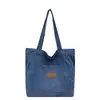 Bolsa de lona de mezclilla simple de gran capacidad, nuevo bolso de hombro casual Otoño 2026, bolso cruzado para axila para mujer