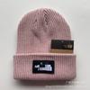 Venta al por mayor de comercio exterior marca de moda gorro de punto japonés casual gorro de lana para hombre y mujer cálido gorro de punto con letras que combina con todo gorro para el frío