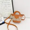 Nueva bolsa infantil para niña, bolso de mano de moda a cuadros, bolsa tipo dumpling, monedero mini, bandolera de moda para niña