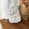 2026 Nova Moda Estilo Coreano Versátil Doce Bolsa de Balde com Bolinhas Bolsa de Ombro Cruzada de Mão de Nicho de Alta Qualidade