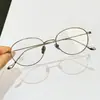 Gafas cat-eye cuadradas-redondas de titanio ultraligeras, ovaladas azules lisas bloqueadoras de luz azul, alambre dorado y plateado, se pueden adaptar con lentes recetados, montura de gafas Danyang para hombre