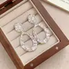 Pendienteslargos vintage con colgante de gota hueca, diseño simple y elegante, estilo popular europeo y americano, tachuelas ovaladas con textura exagerada