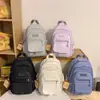 Mochila casual de moda estilo coreano transfronteriza modelo nuevo 2026 bolsa escolar de gran capacidad mochila versátil linda de moda para mujer