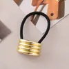 Estilo punk europeo y americano metal personalidad alta calidad cuerda para la cabeza semicírculo tubo redondo anillo para el pelo cuerda elástica para el pelo Balot fabricantes al por mayor