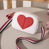 Bolso de moda con diseño de color block en forma de corazón de lichi 2026 Nuevo estilo coreano y japonés Bolso cuadrado pequeño con forma de corazón de celebridad de internet Bolso de hombro único bandolera para mujer